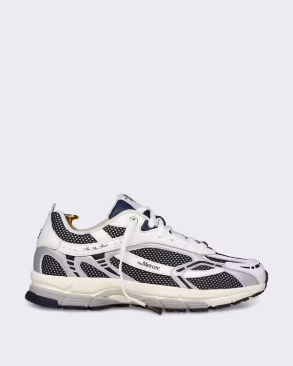 Witte sneaker met zilveren en blauwe details White